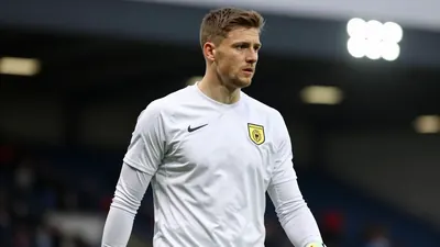 Milton Keynes Dons are seeking a new goalkeeper, with Paul Warne aiming to boost the team's League One prospects