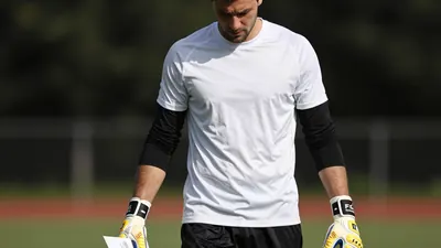 Milton Keynes Dons goalkeeper Connal Trueman signs with Sheffield Wednesday on a one-year contract, with an option to extend